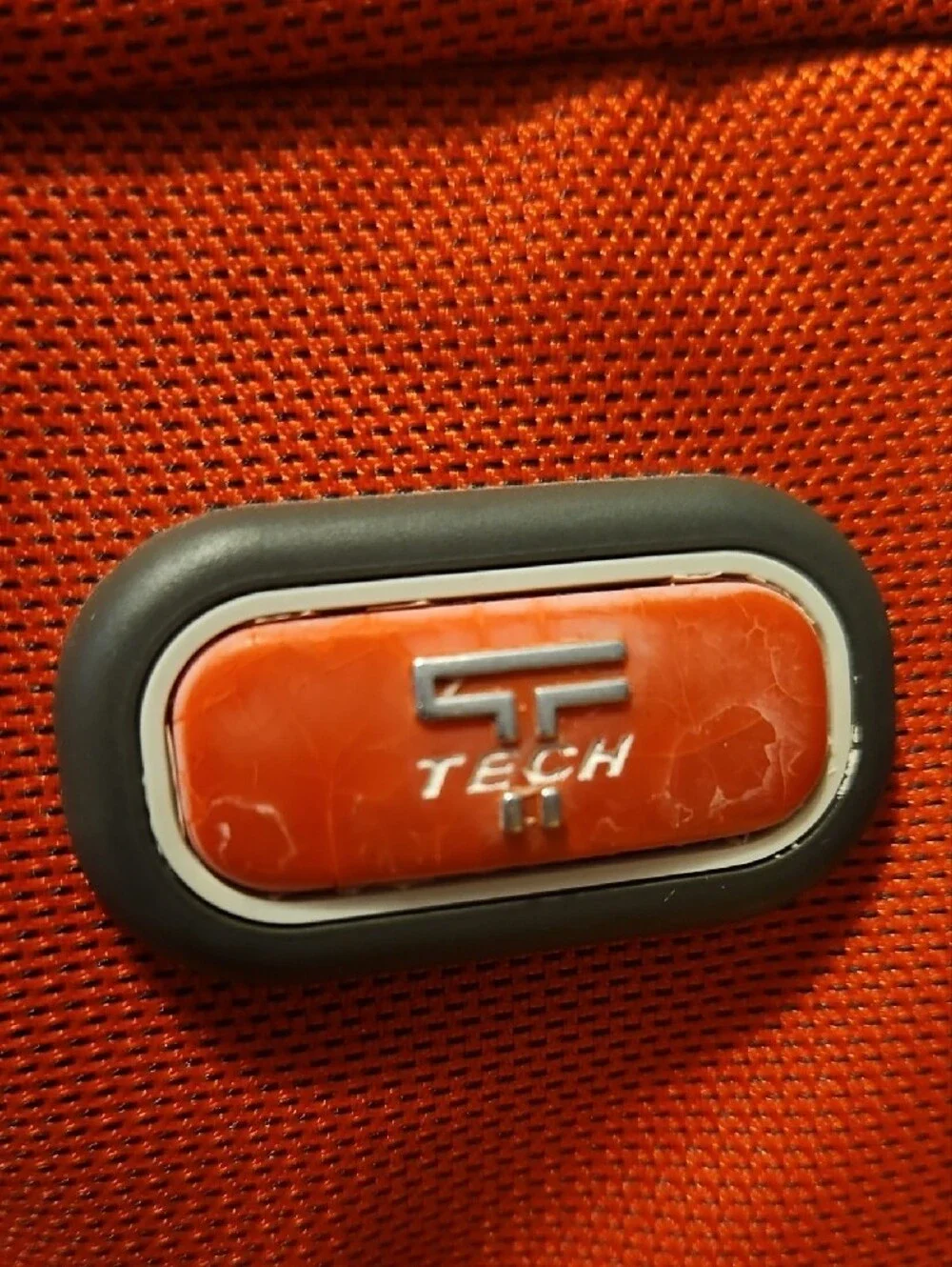 Tumi Orange Laptop Bag with Gray Trim and Front Pocket